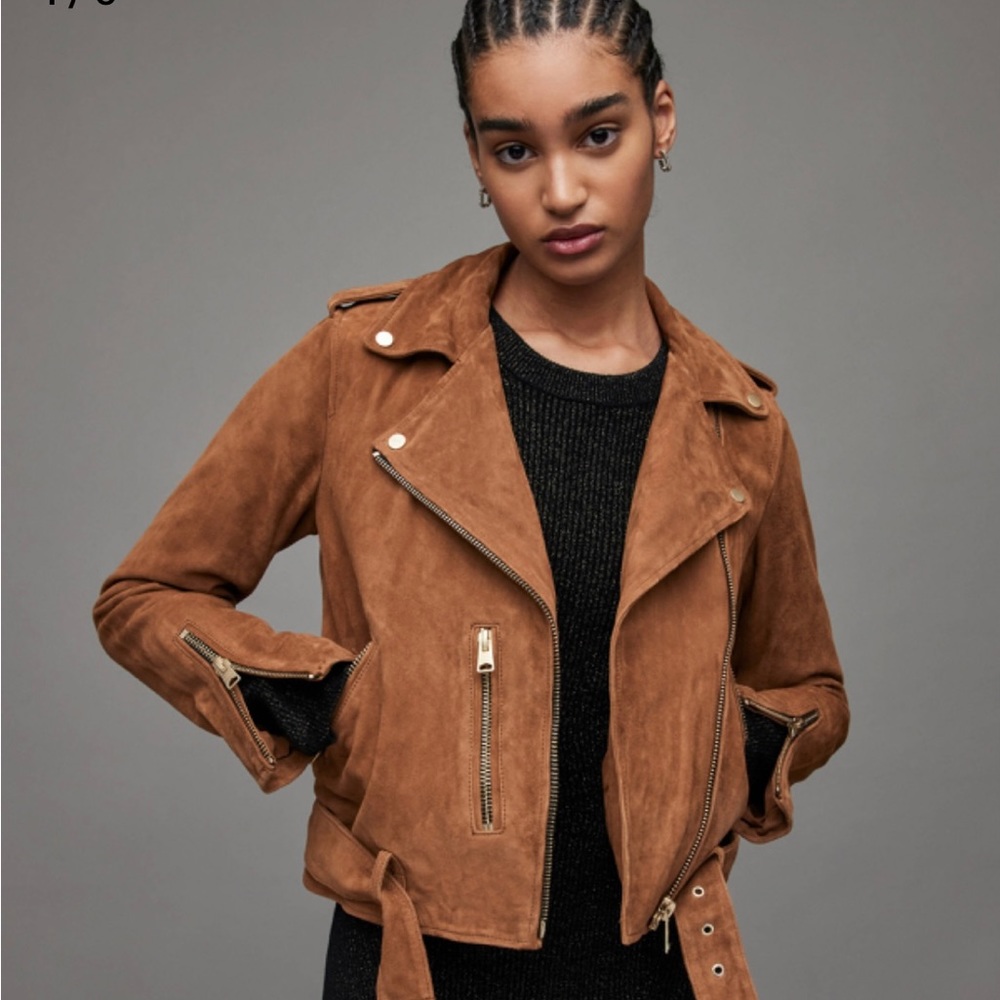 BikerJacket. smooth suede. metal trims. Zip pockets. And a classic waist belt.